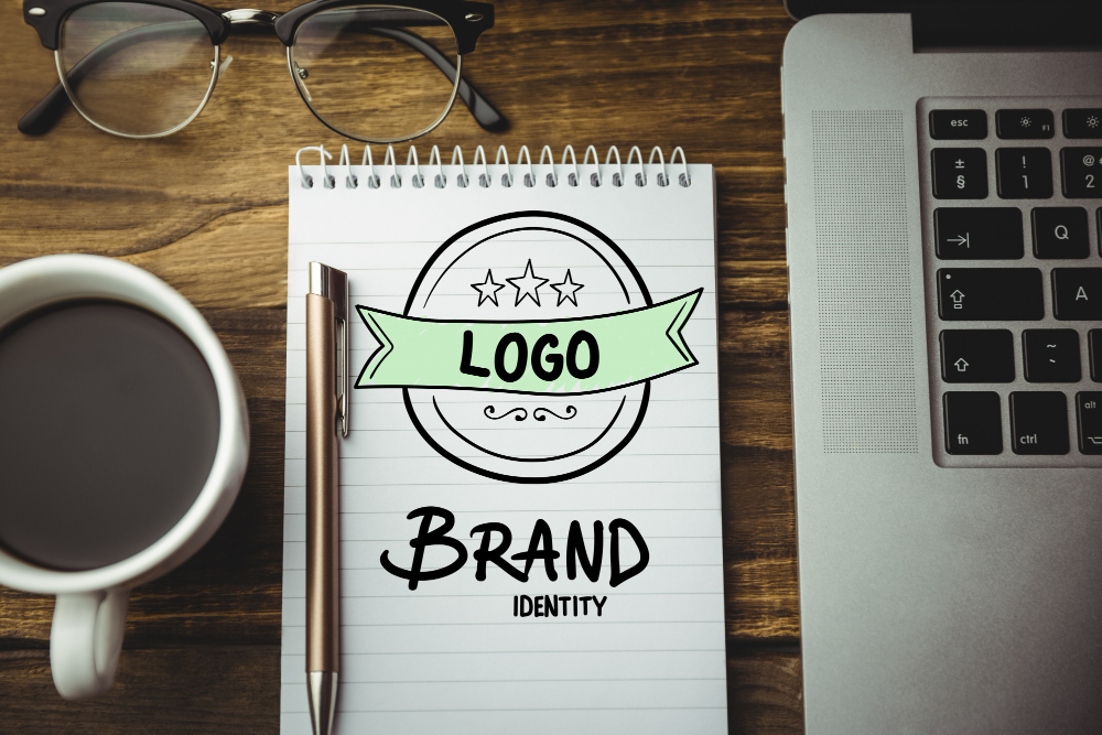 Logo expanding into a complete brand identity system with colour, typography, and applications